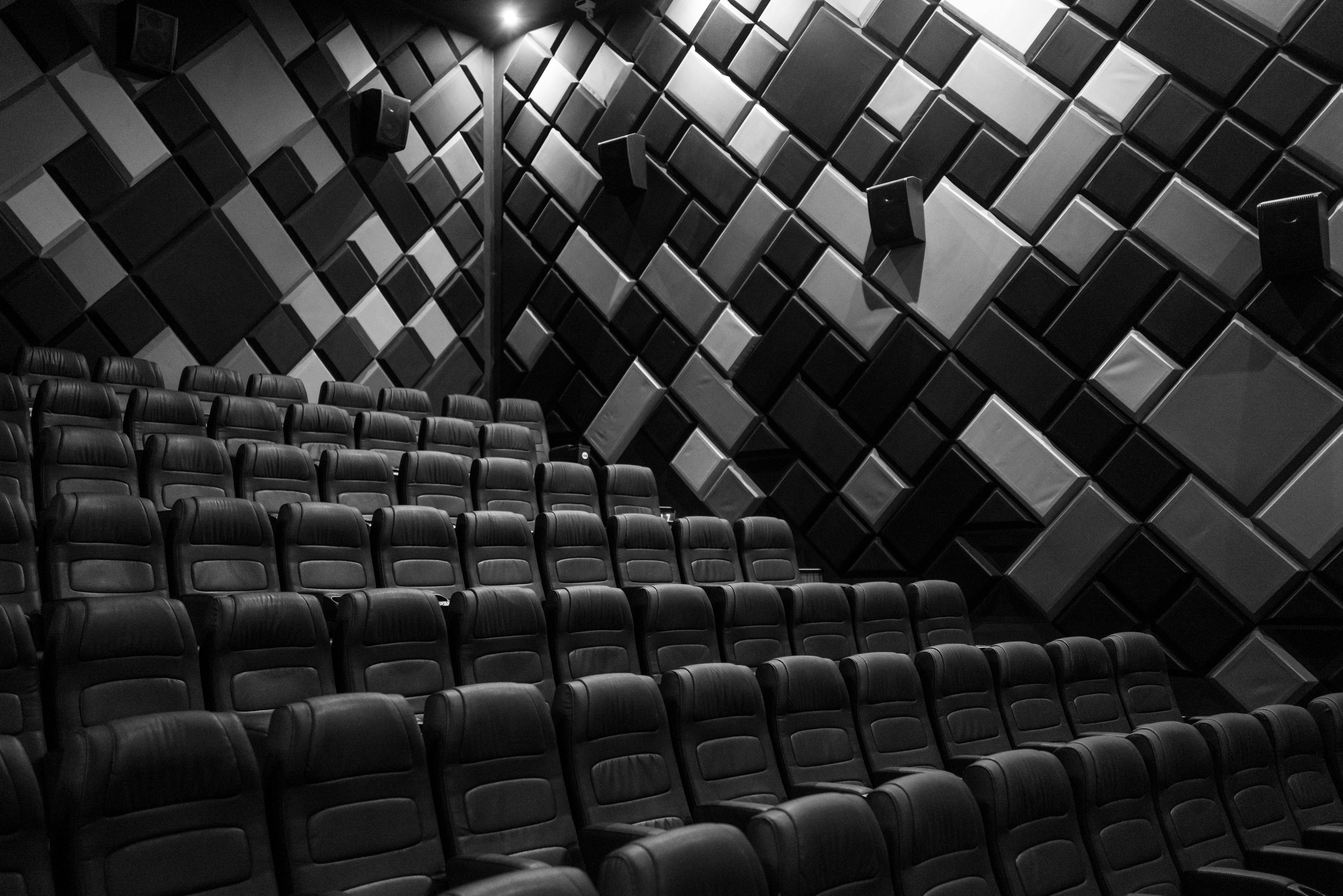 Grayscale image of empty theater seats