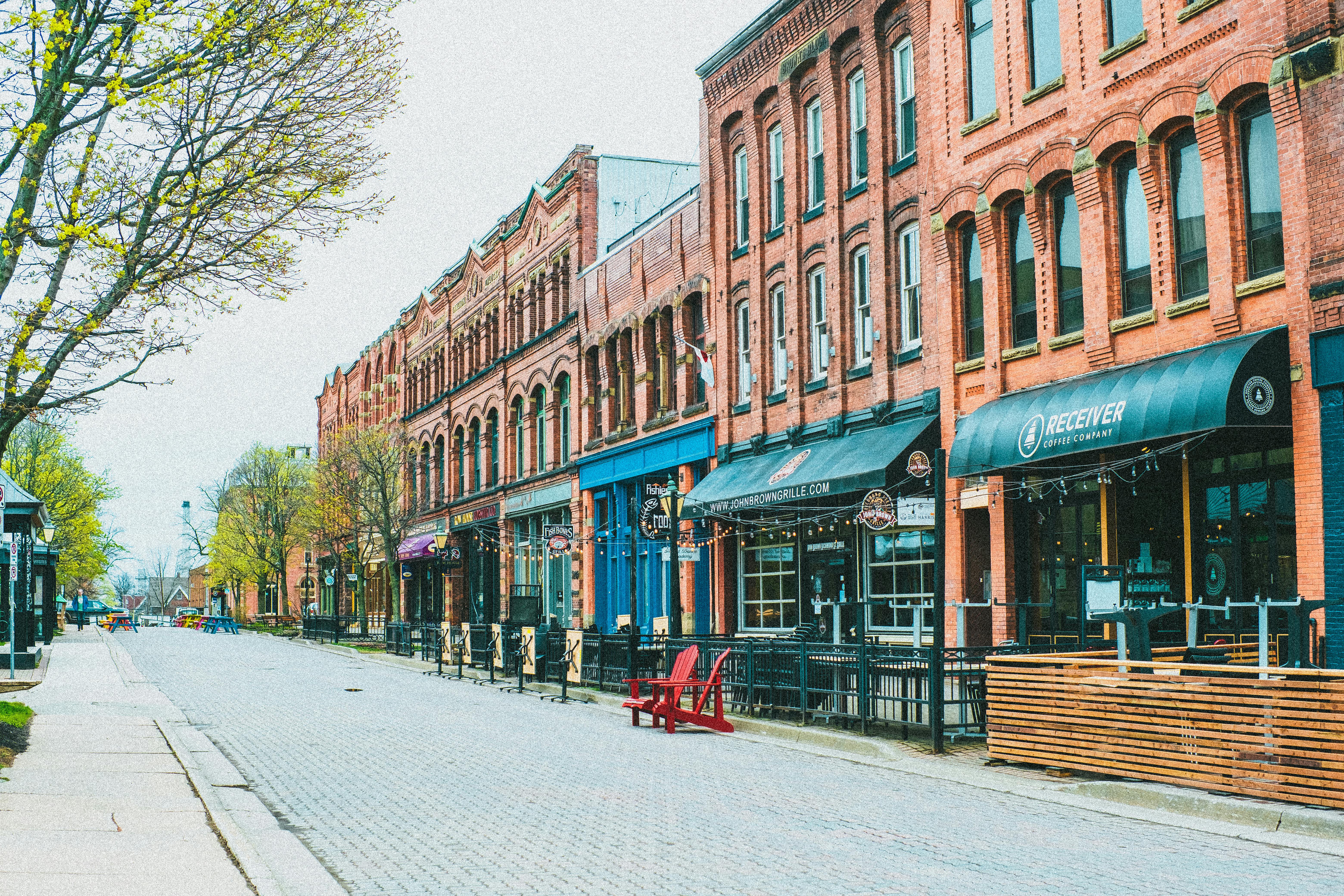 Tenements and bars along a downtown street